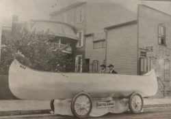Central Garage parade float built to look like a giant canoe