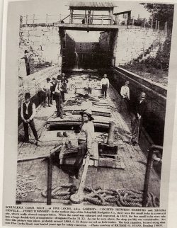 When the canal was enlarged and improved, in 1833, the five small locks were rebuilt into a huge double-lock arrangement-designated locks 31-32. As can be seen above, the drop (or lift) was considerable. At t time this picture was taken, probably around 1880, C. H. Boyer served as lock tender. -Photo courtesy of RICHARD D. EVANS, Reading 19609.